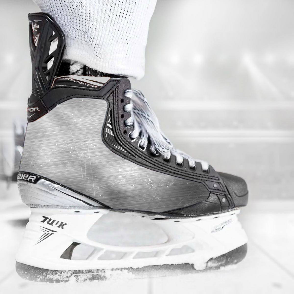 Broken Silver skate skin on a Bauer hockey skate